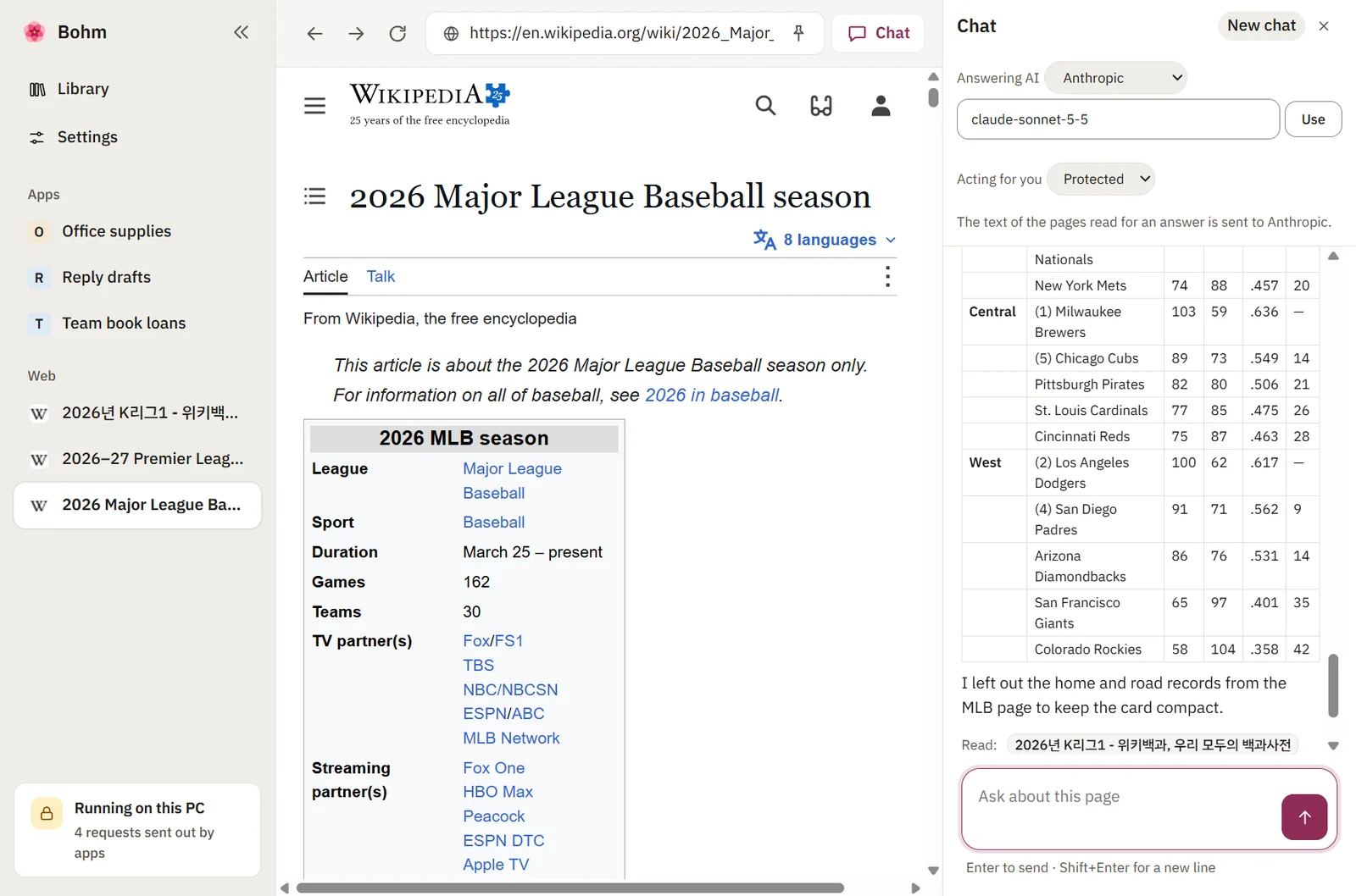 Bohm’s chat beside a Wikipedia page, answering with standings read from the three open tabs